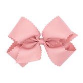Wee Ones bow scalloped edges King Sweet Nectar close-up for polished detail