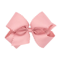 Wee Ones bow scalloped edges King Sweet Nectar close-up for polished detail