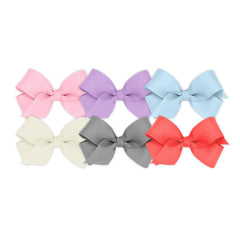 Wee Ones mini bow on WeeStay clip for secure all-day hold