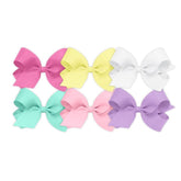Wee Ones bows pink clip closeup showing durable grosgrain texture for everyday wear.