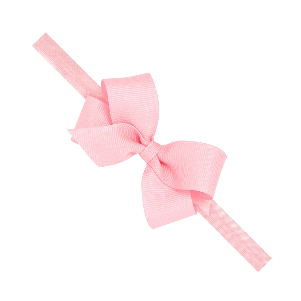 Wee Ones classic grosgrain hair bow on matching baby band in light pink for versatile styling