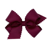 Wee Ones classic grosgrain bow front view on WeeStay clip adds playful style.
