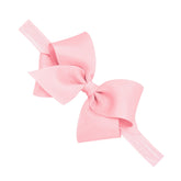 Wee Ones Girls Classic Grosgrain Hair Bow on Baby Band close-up, gentle hold for all hair types.