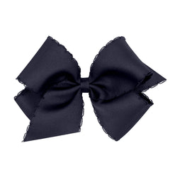 Wee Ones girls classic grosgrain Moonstitch bow on WeeStay clip in navy for secure all-day wear