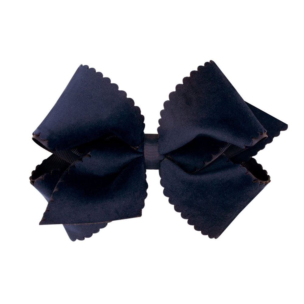 Wee Ones navy grosgrain bow with scalloped velvet overlay for chic school-day outfits.