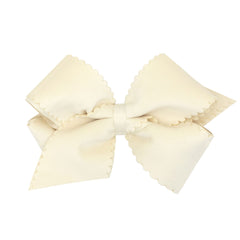 Wee Ones antique white bow with scalloped velvet for versatile everyday wear.