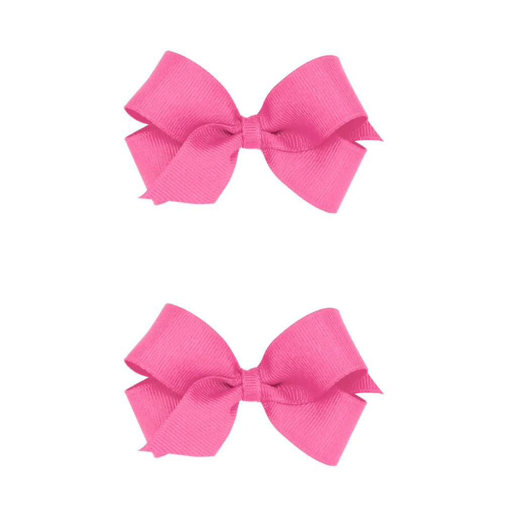 Wee Ones mini hot pink grosgrain bow with Wee Stay No Slip Clip—secure hold.