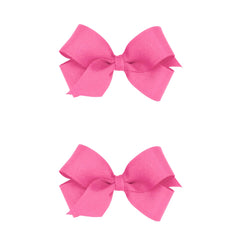 Wee Ones mini hot pink grosgrain bow with Wee Stay No Slip Clip—secure hold.