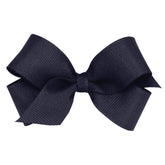 Wee Ones mini classic grosgrain bow on WeeStay clip in navy, secure all day