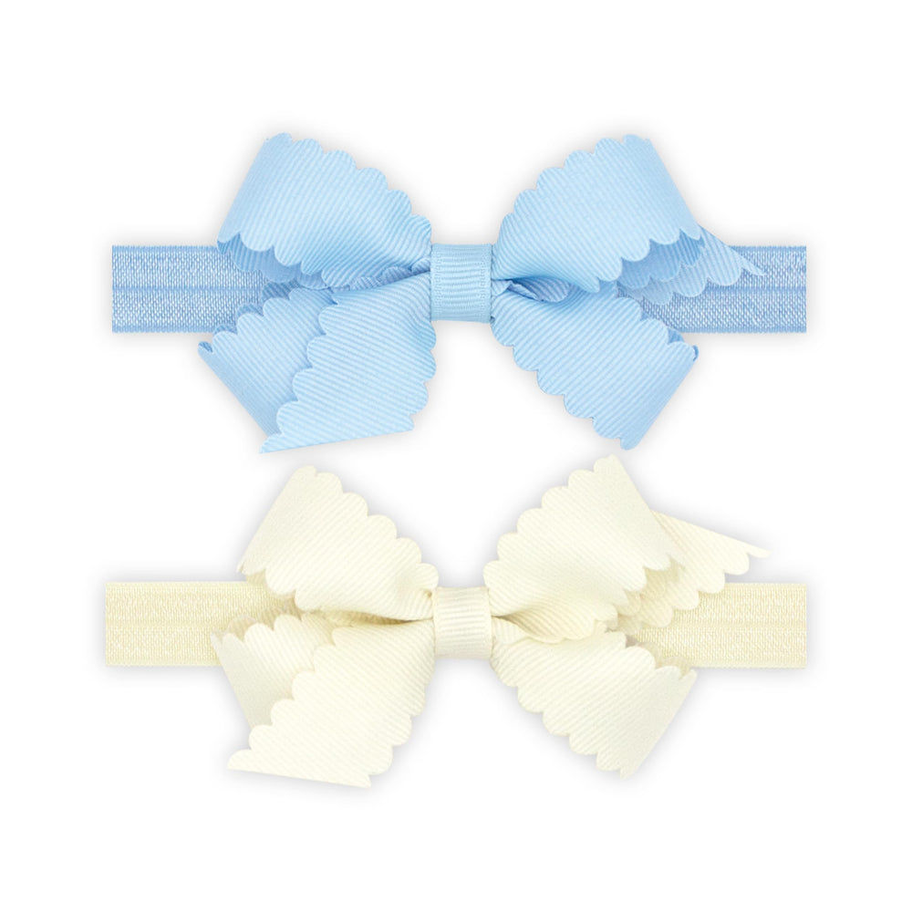 Wee Ones mini scalloped bows on elastic bands ideal for everyday outfits.