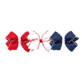 Wee Ones Moonstitch grosgrain clip set in vibrant red, white, blue for playful styles.