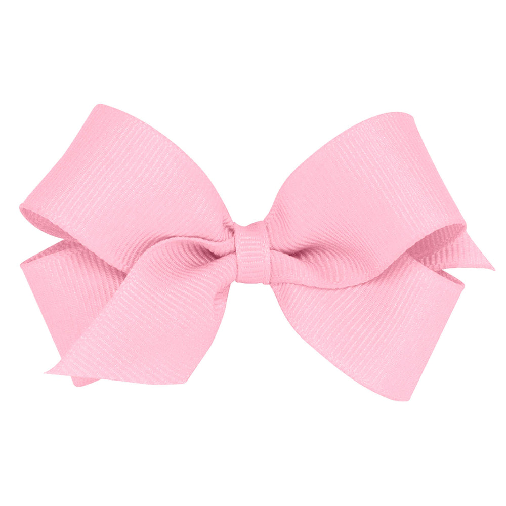 Wee Ones Pearl Pink bow on WeeStay clip keeps hairstyle secure all day