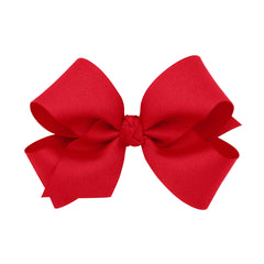 Wee Ones premium hair bow knot wrap center on WeeStay clip securing comfortable wear.