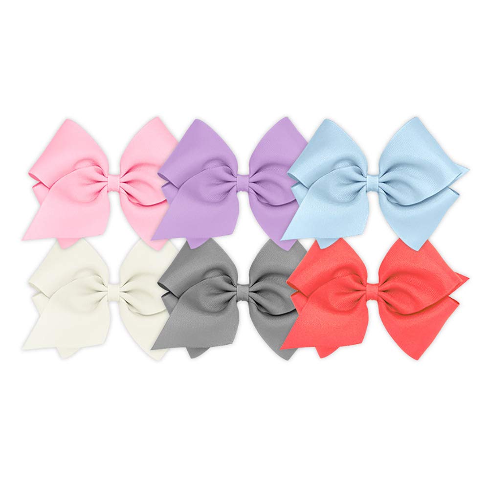 Wee Ones six-piece bows on a WeeStay no-slip clip demonstrate secure everyday wear.