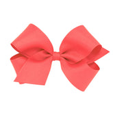 Wee Ones Watermelon bow closeup highlights sturdy WeeStay clip for secure all-day wear