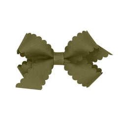 Wee Ones Sage bow on WeeStay clip, front view, secure all-day wear.