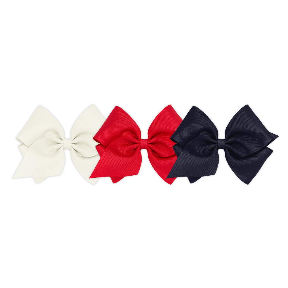 Wee Ones WeeStay No-Slip Clip closeup on solid grosgrain texture for secure daily wear.