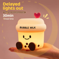 WesData bubble milk cup night light in dimmed mode highlights three brightness levels
