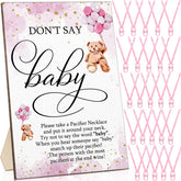 Wesiti wooden don't-say-baby sign on table for clear party signage.