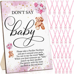 Wesiti wooden don't-say-baby sign on table for clear party signage.