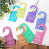 Whaline acrylic baby closet divider pastel set for orderly age-group sorting.