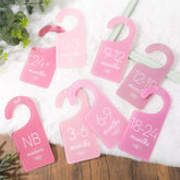Whaline acrylic baby closet divider pink side view showing its slim profile for organized outfits