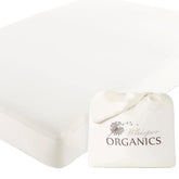 Whisper Organics organic crib mattress protector top view shows soft breathable surface for gentle sleep