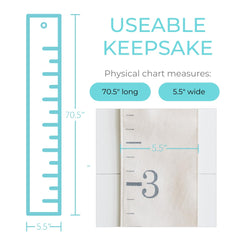 White Loft growth chart hanging in a bright kids room emphasizes easy wall decoration and growth tracking