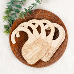 Whitluck's Baby Closet Dividers front view shows durable wood for tidy newborn to toddler outfits.