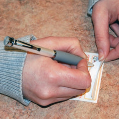 Whoozems self-laminating labels seal writing and reduce smudges.