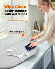 Widitn pad features strap and non-slip base for secure diaper changes