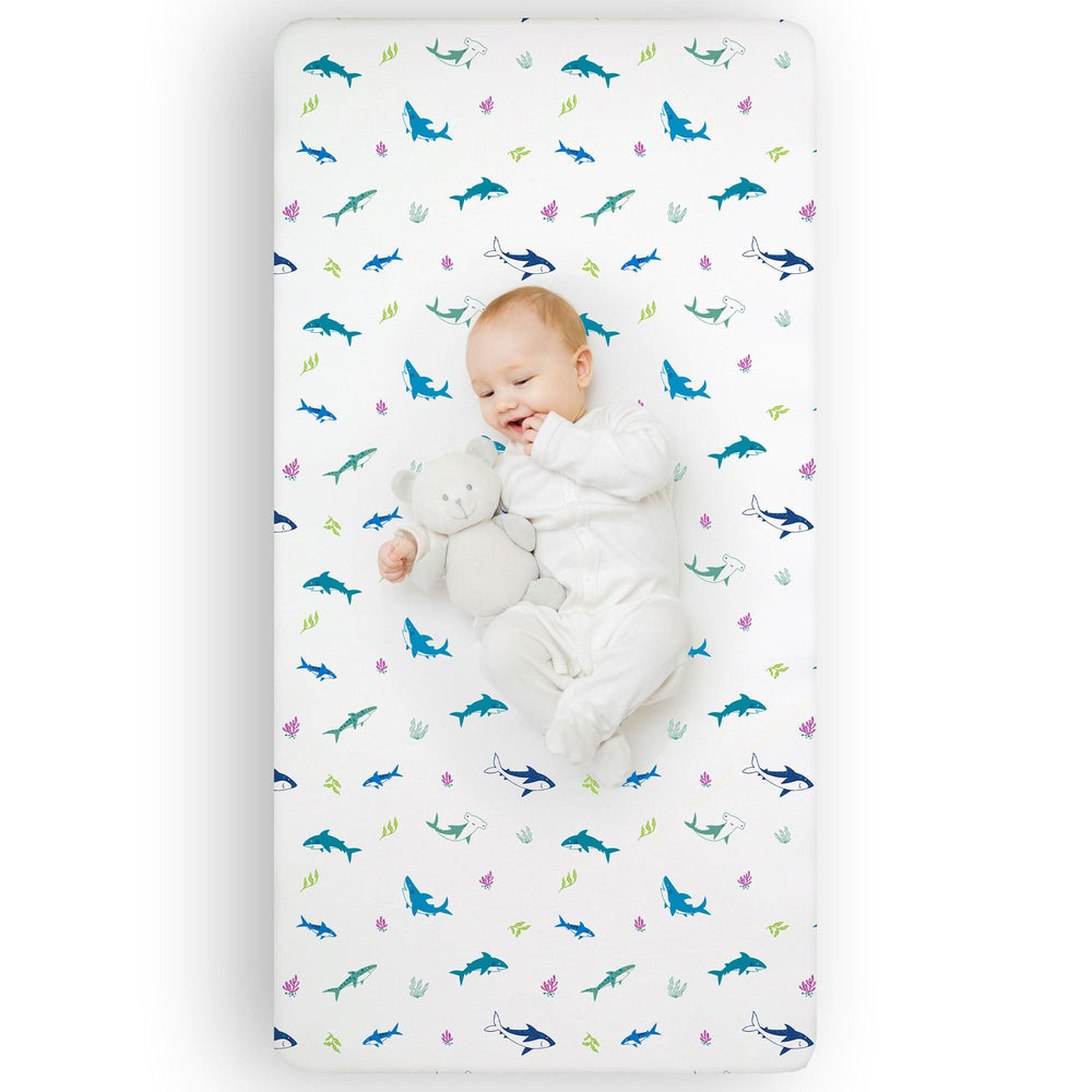 Wildkin Shark Attack crib sheet on a standard 52 x 28 crib mattress showing soft comfort