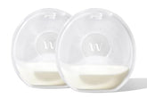 Willow Catch-All Milk Cups worn in bra to discreetly collect milk.