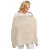 Wimist muslin nursing cover beige fabric closeup highlights breathable texture for comfortable breastfeeding.