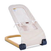 Winchild Baby Bouncer wood-grain seat highlights ergonomic design for comfortable infant support.