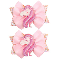 WIWUFUE pink glitter unicorn hair bow clip close-up for party-ready hairstyles.