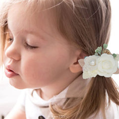 WNYUJOY flower hair clip on toddler hair demonstrating easy one-hand snap