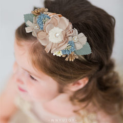 WNYUJOY handmade flower close-up headband highlights natural fabric softness.
