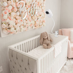 Wochel clip-mount on crib-rail demonstrates quick tool-free installation.