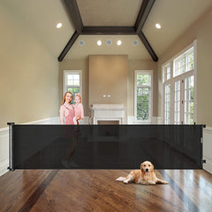 WOMHOM 100-inch extra-wide gate rolled up to save space in a living area.