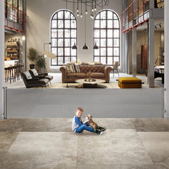 WOMHOM 140-inch outdoor retractable gate extended in doorway for pets and kids.