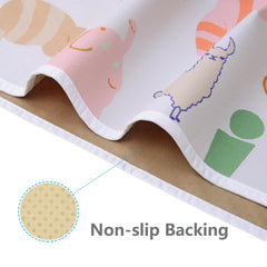 WOMUMON baby splat mat folded for travel easily fits in a bag.