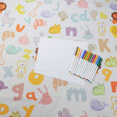 WOMUMON splat mat for arts and crafts acts as a wipe-clean table protector.