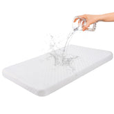 Wonder Living bassinet topper waterproof exterior keeps baby dry during spills.