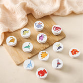 Wooden Teether dinosaur knob closeup highlighting natural wood texture for charming nursery decor