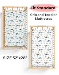 Woodiville Aquatic Adventures crib sheet elastic band highlights secure fit for peaceful nights.