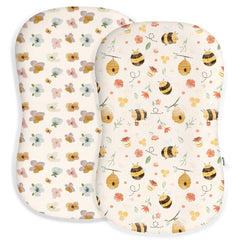 Woodiville baby lounger cover 2-pack shows soft fabric and snug fit for easy changes.