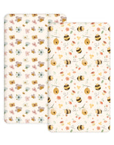 Woodiville Bee Happy pack n play sheet fit keeps surface secure and smooth for nap time.
