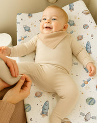 Woodiville Stellar Adventure 360fit elastic demonstrates slip-free diaper changes.