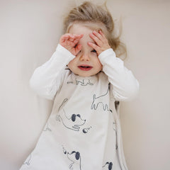 Woolino double shoulder snaps simplify dressing and swaddle transition.